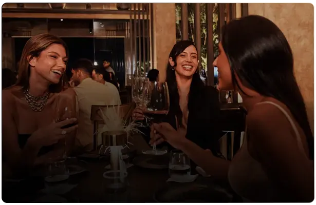 Group of women toasting in an event venue in Cancun