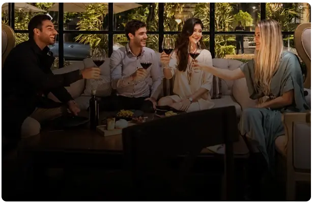 Coworkers toasting at Parole Restaurant in Polanco