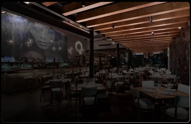 Restaurant in Cancun with an artistic mural and elegant tables