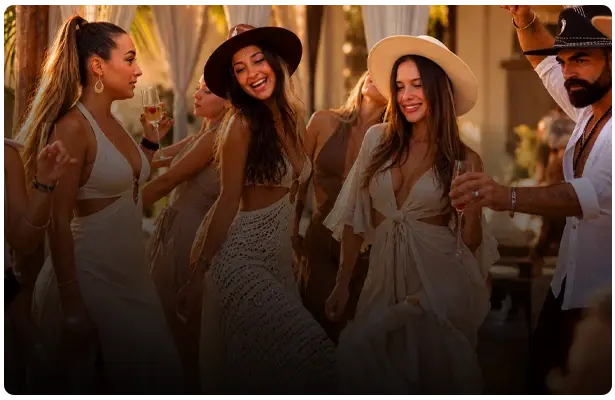 Group of people dancing and celebrating at Taboo Beach Club in Tulum
