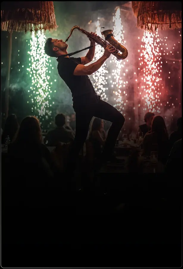 Person playing the saxophone at Taboo restaurant