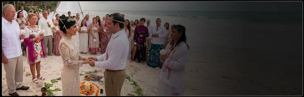 Couple at a beach wedding ceremony in Tulum